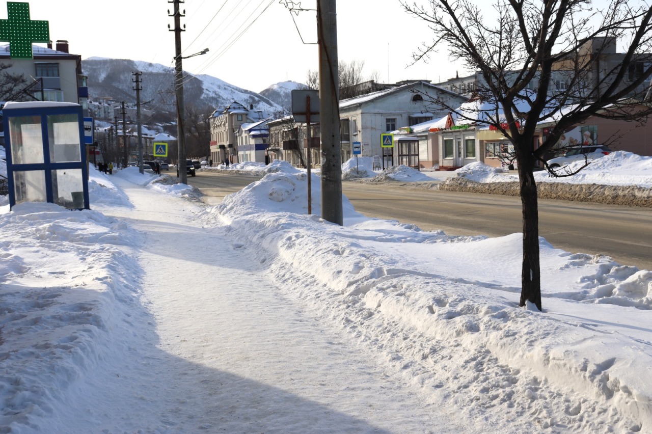 Улица города в снегу